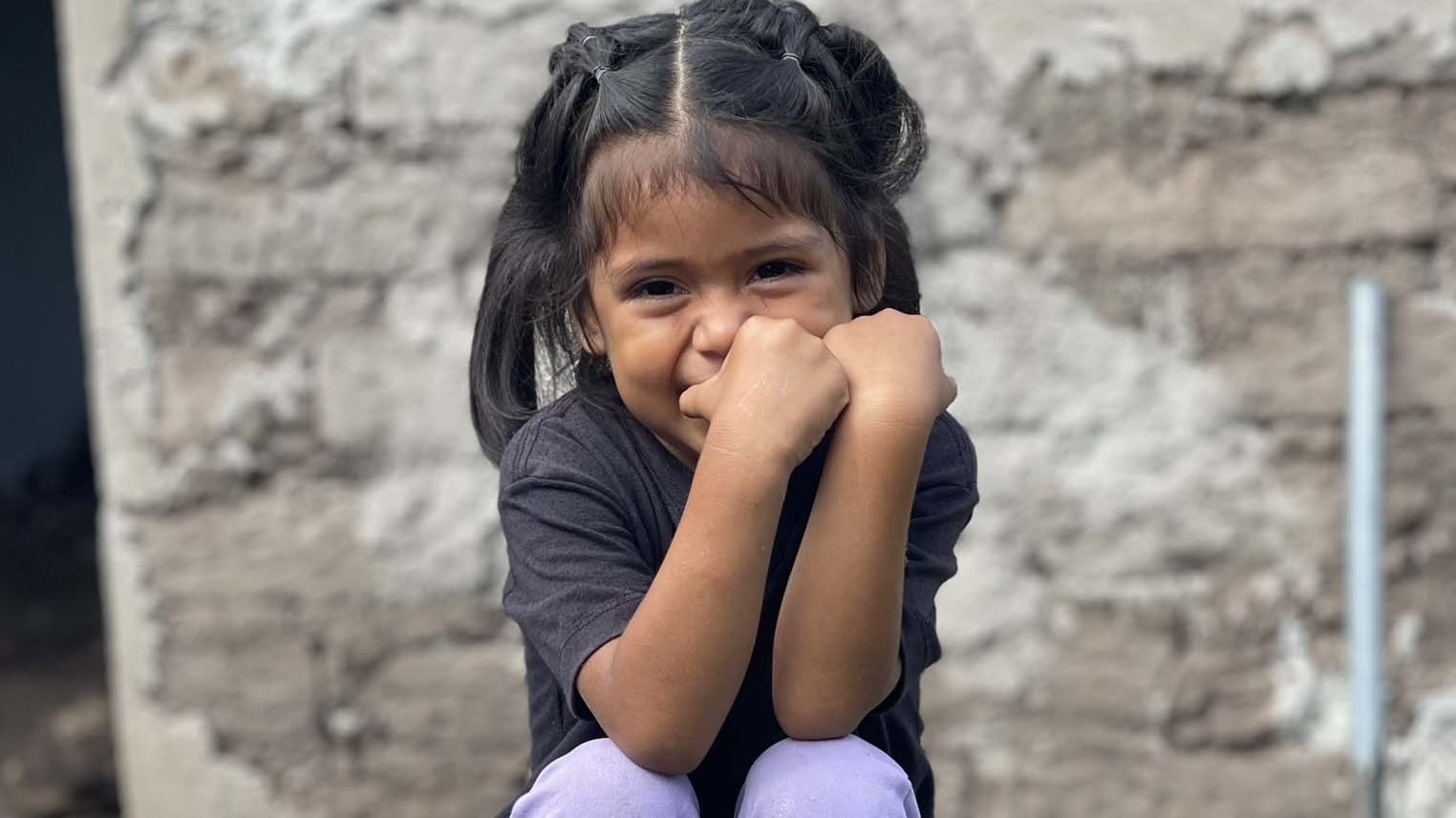 Group of young boys packing food bags