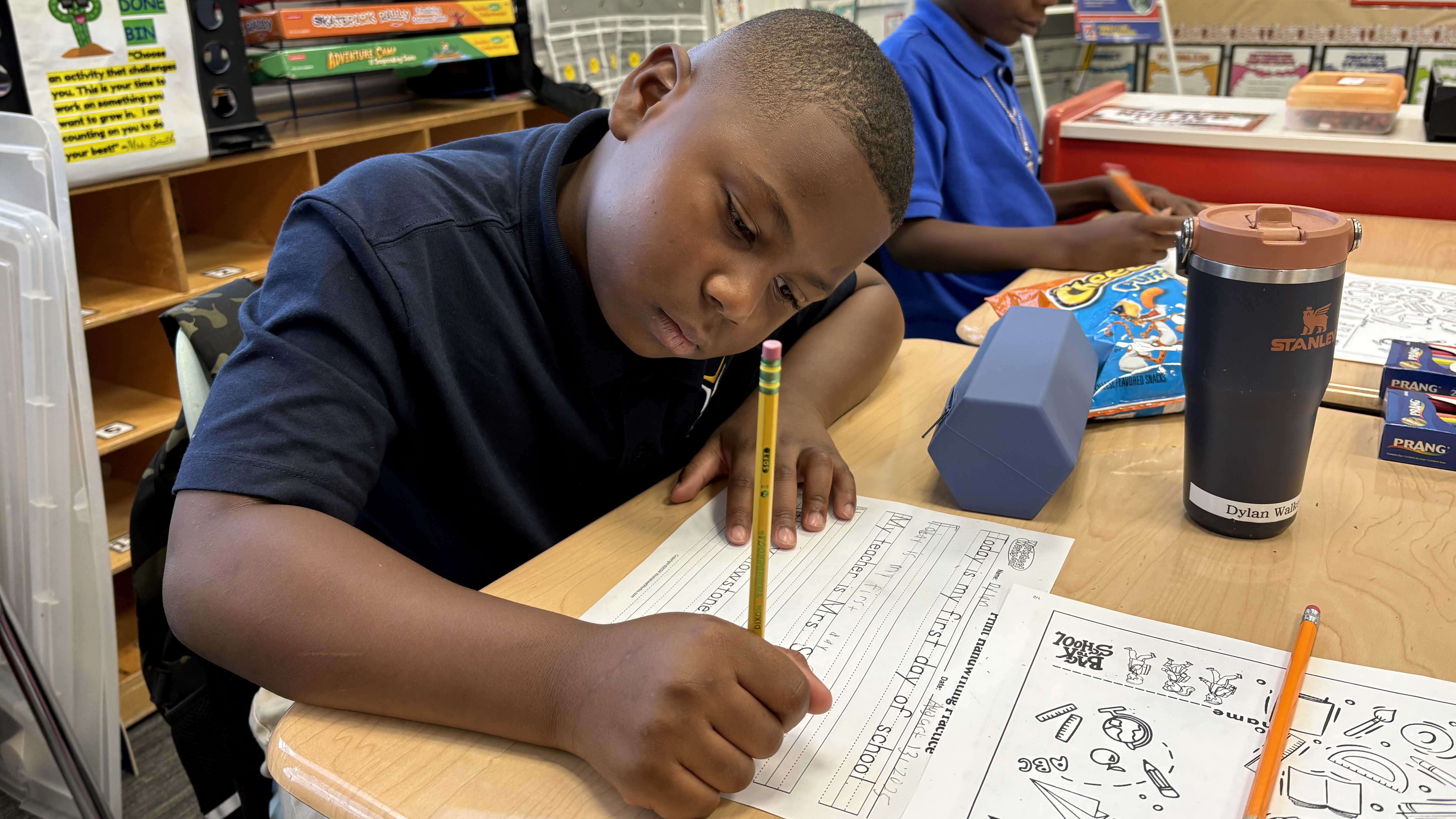 Group of young boys packing food bags