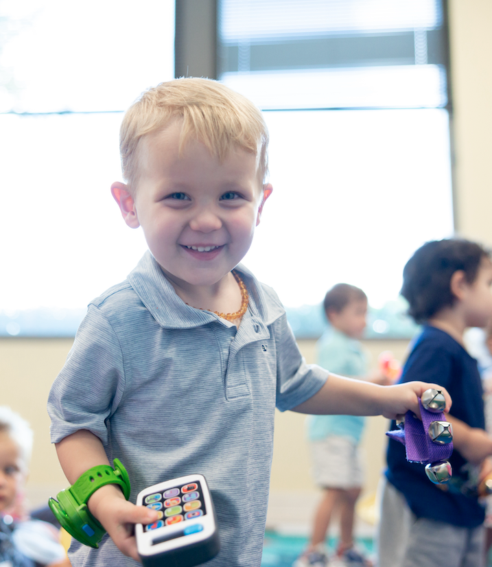 Little boy playing with phone